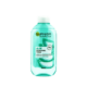 Un flacon de Garnier SkinActive Naturals Aloe Vera Lotion Tonique Végétal Hydratant 200 ml capture l'essence des rivages tranquilles de Dakar avec sa teinte bleu-vert clair. L'étiquette met en valeur l'aloe vera pour les peaux normales à mixtes, avec un bouchon blanc propre, offrant une touche rafraîchissante de la beauté naturelle du Sénégal. Dakar